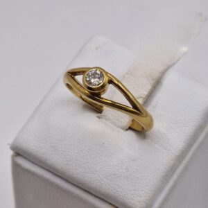 Anello “a occhio” con brillante